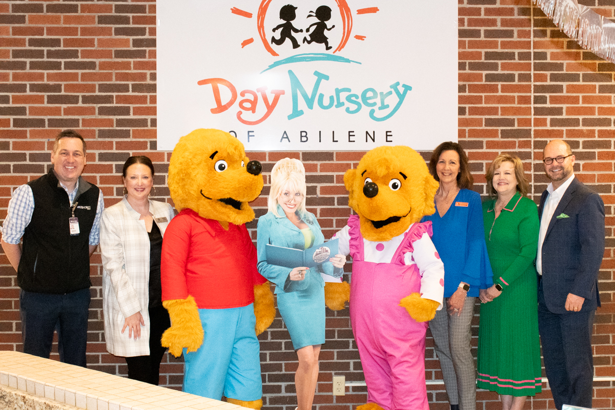Hendrick Health pediatric healthcare ambassadors Brother Bear and Sister Bear visit children at Day Nursery of Abilene to kick off our support for the local chapter of Dolly Parton's Imagination Library.